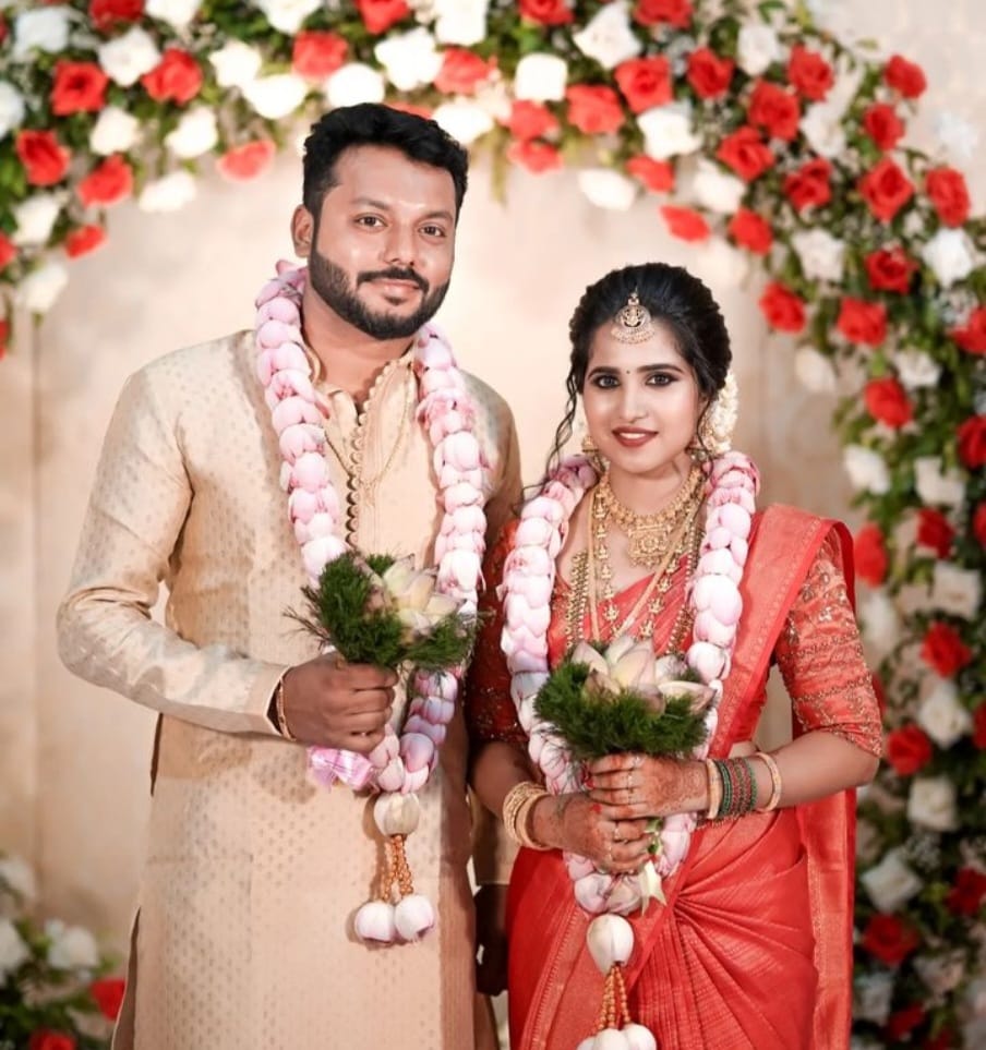 Bride in Red Silk Saree with Groom